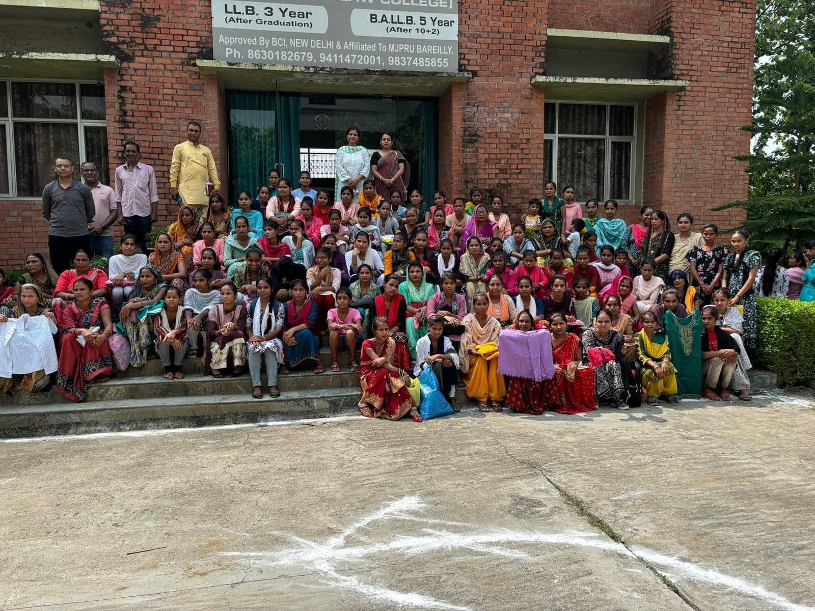 Women trained at the Foundation's sewing centres meet at Silver Law College, July 2024