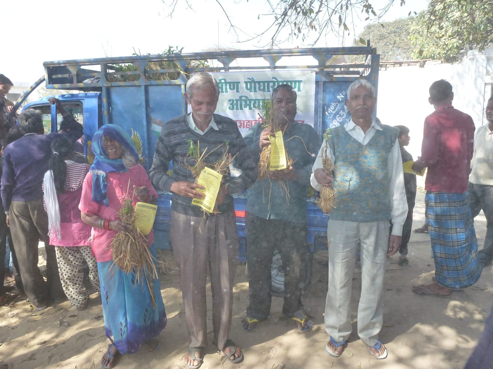 Villagers with their fruit saplings during the IRCON-supported drive, 2017