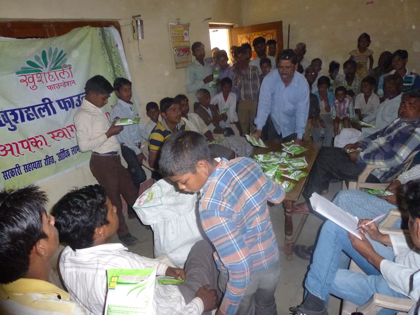 Farmers collect vegetable seed packets, March 2017